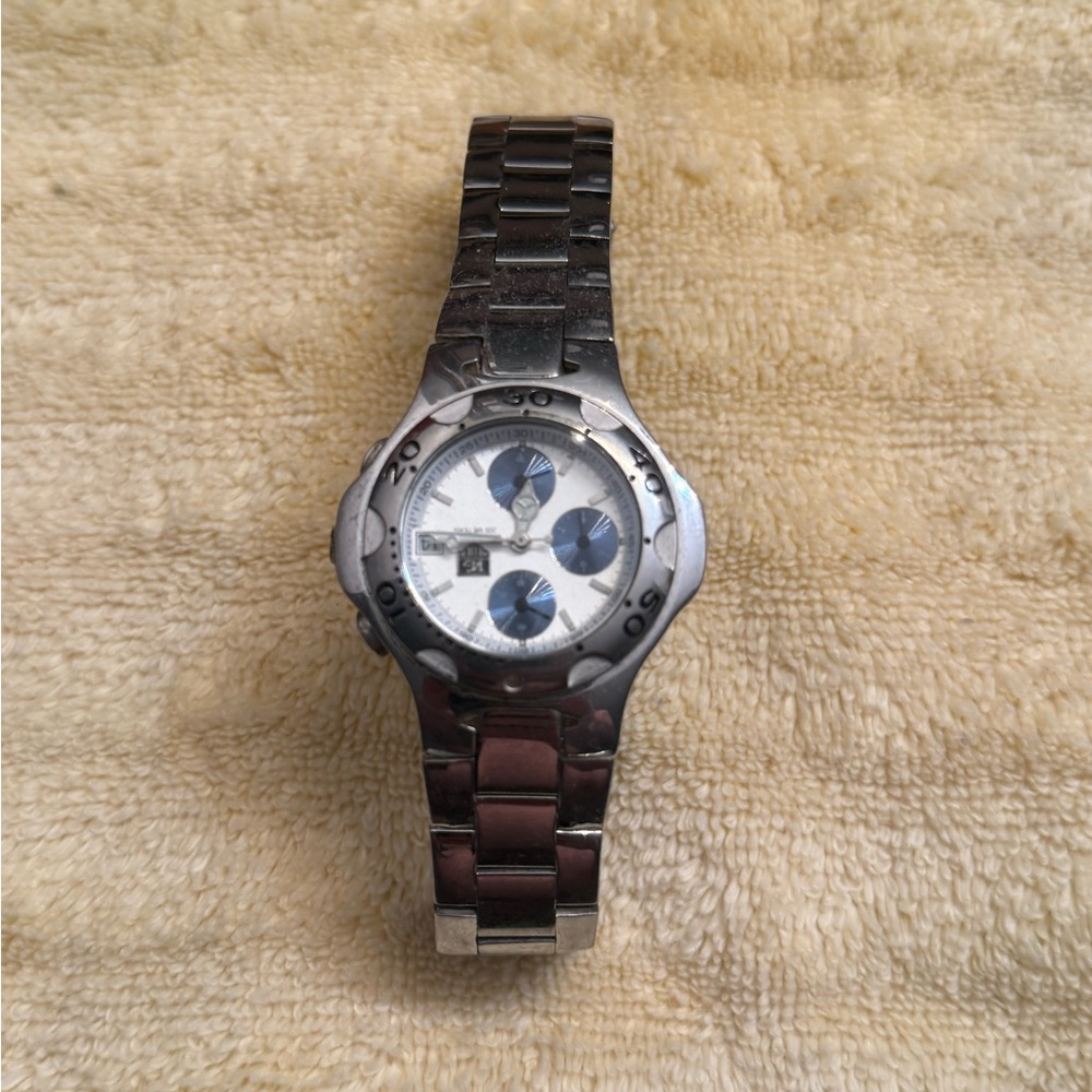 Tag Heuer Men's Watch with Silver Band and Blue Accents